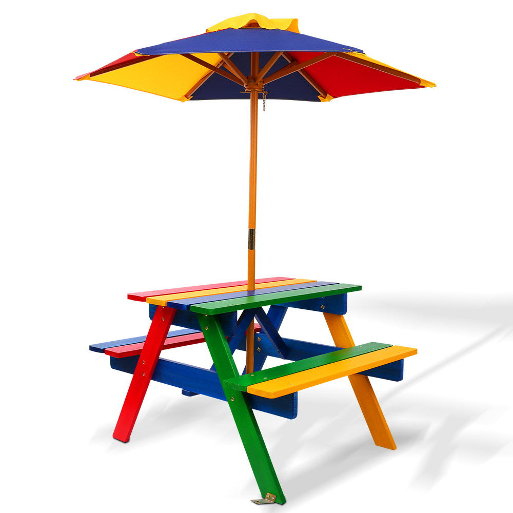 Colorful children's picnic table with umbrella on a white background
